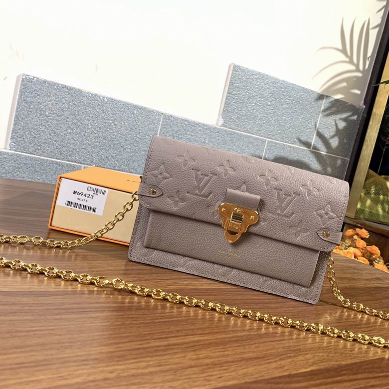lv vavin chain wallet review